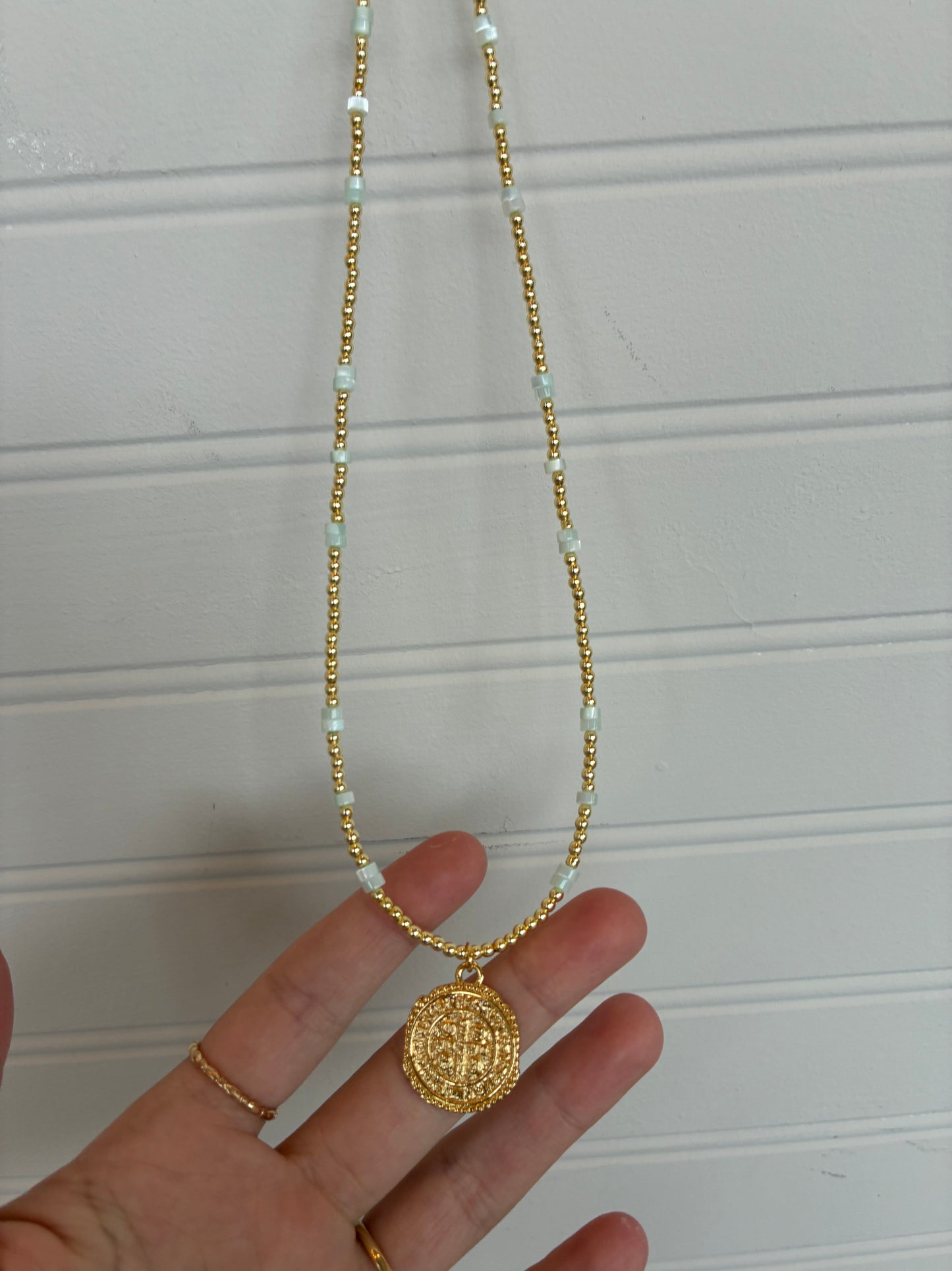 Gold Coin Necklace with Hints of Blue
