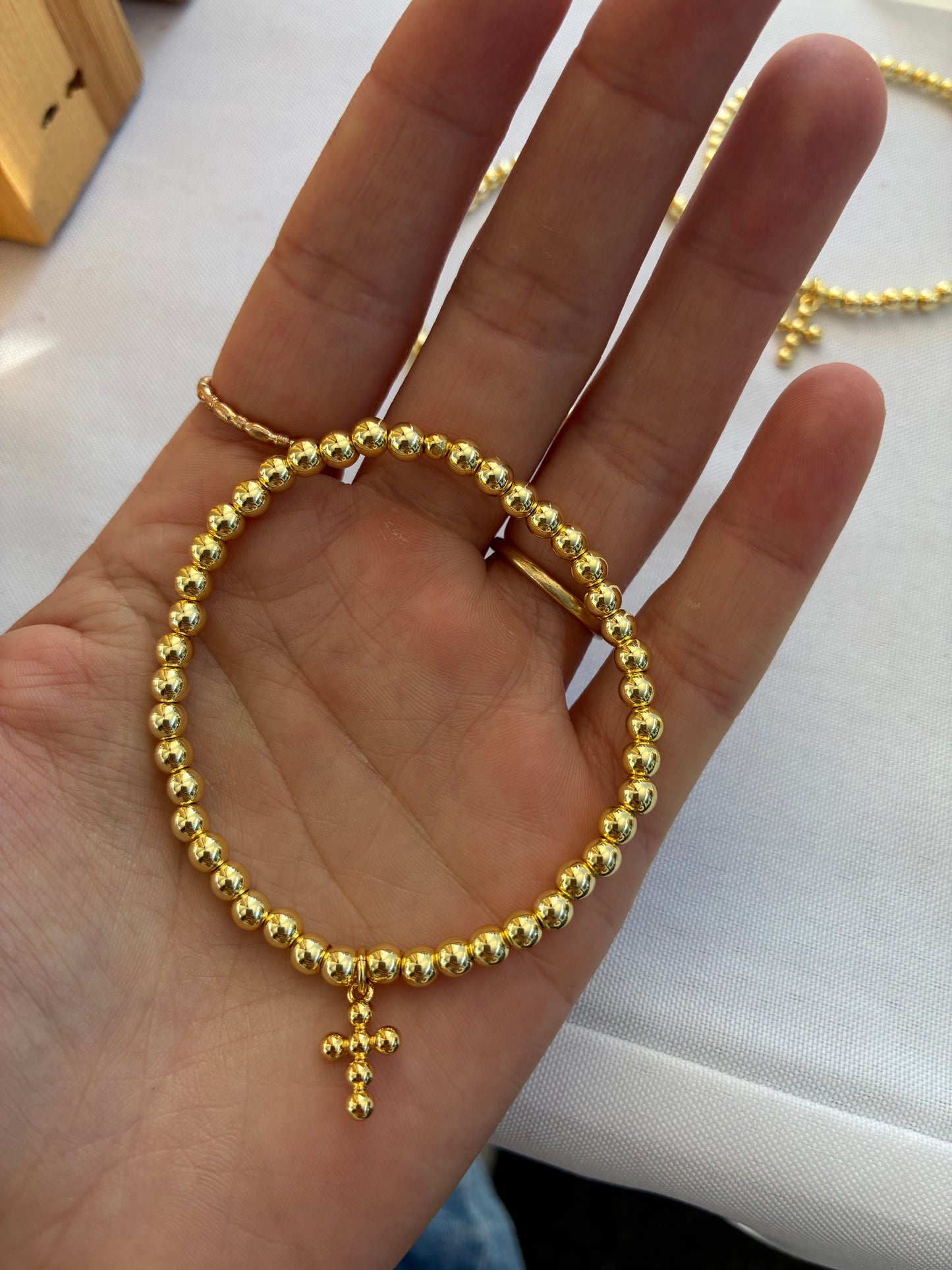 Gold Bracelet with Cross Charm