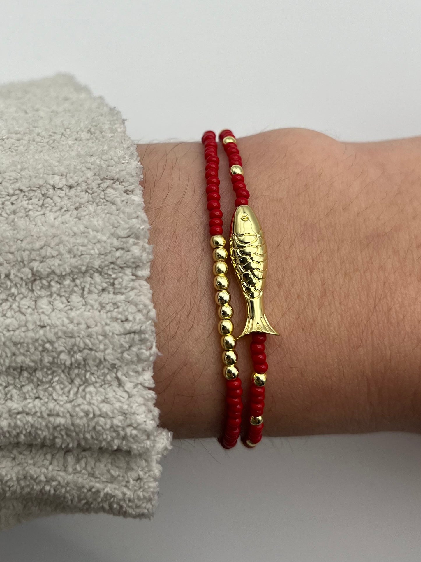 Red Bracelet with Gold Detail